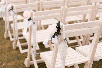 Chairs for wedding ceremony guests, wedding decor, selective focus