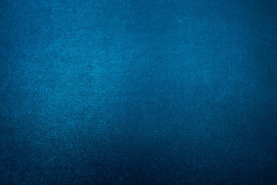 Turquoise Blue Metallic textured background with a gradient.