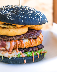 powerful burgers with juicy cutlets, fresh vegetables and crispy buns.