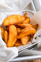 crispy, juicy snacks with delicious sauce. wings, fries, potato wedges, nuggets