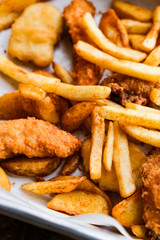 crispy, juicy snacks with delicious sauce. wings, fries, potato wedges, nuggets
