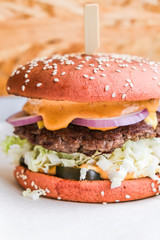 powerful burgers with juicy cutlets, fresh vegetables and crispy buns.