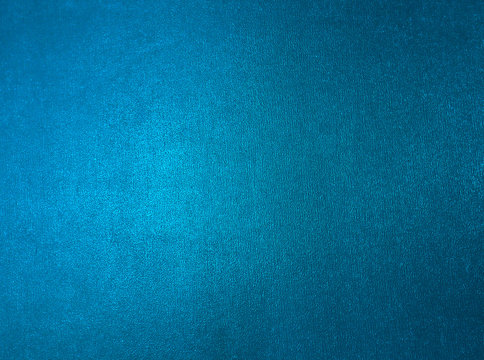 Turquoise Blue Metallic textured background with a gradient.