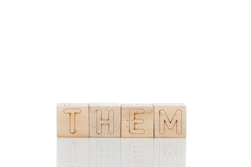 Wooden cubes with letters them on a white background
