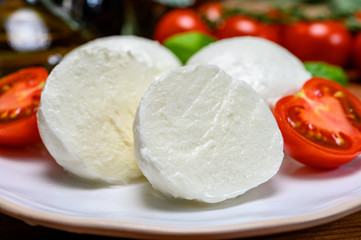 Cheese collection, white italian mozzarella cheese balls for salad or for appetizer snacks from deli shop in New York, USA