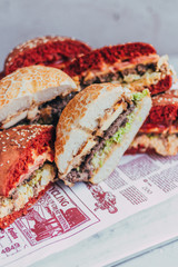 powerful burgers with juicy cutlets, fresh vegetables and crispy buns.