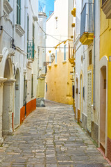 Fototapeta na wymiar Street in Gallipoli, Apulia, by Ionian Sea, Italy