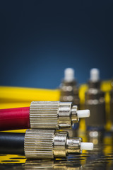 Fiber optic patch cord close-up, speed internet network telecom and technology