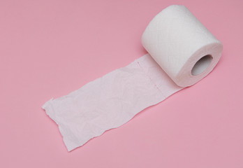 Toilet paper on background.
