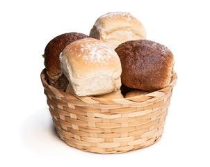 Group mini buns in wicker basket isolated on a white