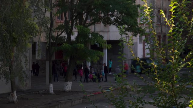 People come into the building. School. Lead children in school. Time lapse 4K