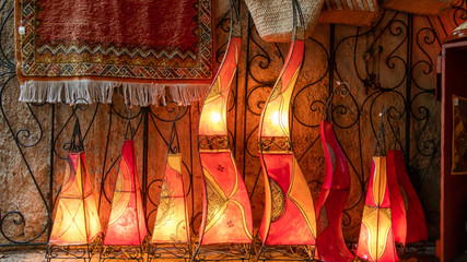 red curved triangle lamps
