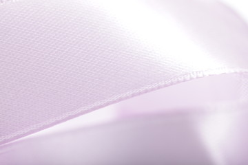 Abstract defocused purple satin ribbon for background