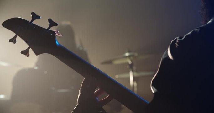 Rock duet performing. Professional guitarist and drummer rocking the party up in club, playing coll rock, punk or metal music 4k footage