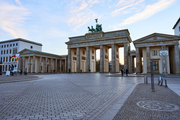 Fototapeta premium Brandenburg Gate at Parisian Squre in the sunset, Empty Square without tourists, visitors or other peoples 