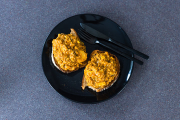 healthy plant-based food, open sandwich with cauliflower rice and vegan curry sauce