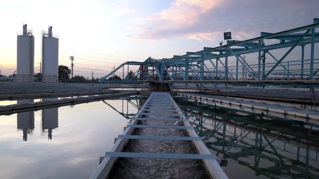 4K Video of The Solid Contact Clarifier Tank type Sludge Re-circulation in Water Treatment plant with sunrise. Water purification, Water treatment system, sewage water or industrial concept