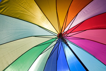 LGBT Umbrella protects rights, shining in the sun with many colors.