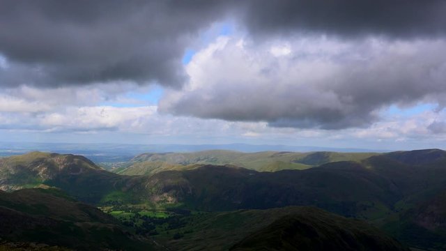Time lapse of clouds over mountains wild places UK 4K
