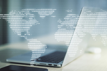 Multi exposure of abstract creative digital world map on modern laptop background, tourism and traveling concept