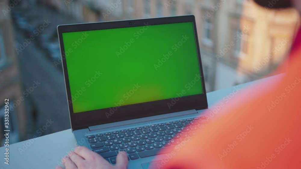Wall mural on balcony man hands engineer using laptop computer with green screen worker project occupation buil