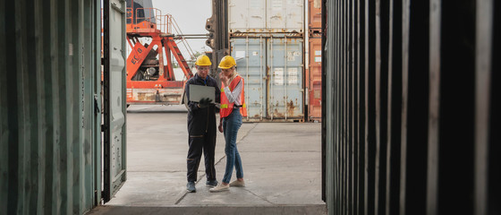 industrial background of containers cargo inspector working with shipping agent to inspect goods in...