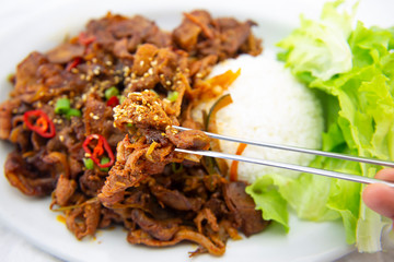 Stir fried with pork and vegetables sprinkle sesame seeds