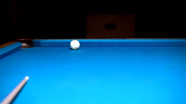 Trick shot in american pool billiard side spin one ball in the corner and cue ball into nine ball