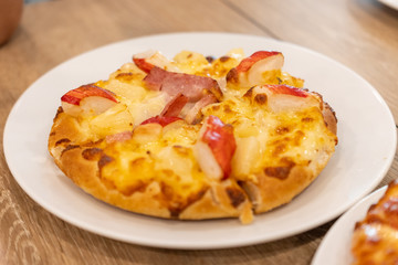 Pizza Hawaiian with pineapple and ham