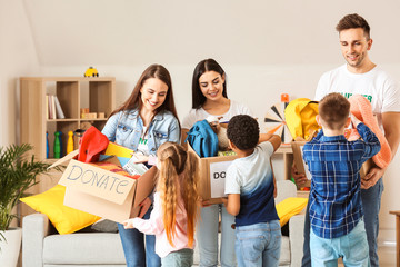 Volunteers with donations and children at orphan home