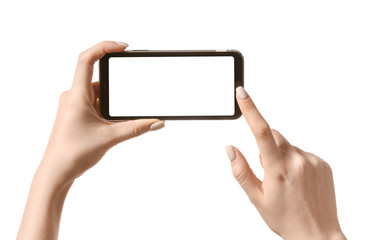 Female hands with mobile phone on white background