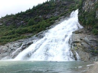 Fototapeta premium Waterfall at Mendenhall Glacier in Alaska
