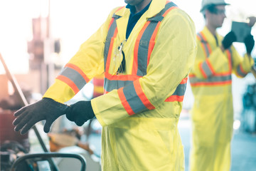 Industrial Engineers in Hard Hats.Work at the Heavy Industry Manufacturing Factory.industrial worker indoors in factory. man working in an industrial factory.Safty first concept.