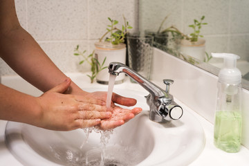 rinsing hands after a clean