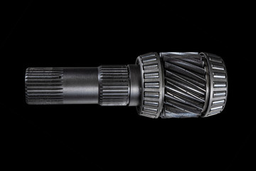 close-up spare part of a car, automatic transmission gear on black isolated background