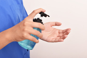 women washing hands with alcohol gel or antibacterial soap sanitizer