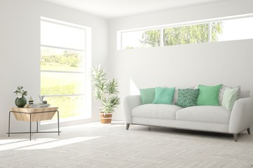 White living room with sofa and summer landscape in window. Scandinavian interior design. 3D illustration