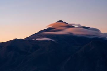 Long exposure of the majestic Cotacachi volcano seen from Otavalo at sunset, North of Quito,...