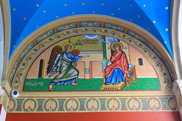 Beautiful mosaic showing the Annunciation to the Virgin Mary outside of Christian orthodox church...