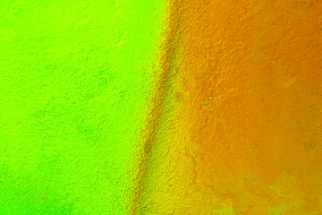 Beautiful bright colorful street art graffiti background. Abstract creative spray drawing fashion colors on the walls of the city. Urban Culture, yellow ,green , sunny, salad , light texture