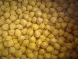 Chickpeas i.e. safed chana soaked in water for cooking, India