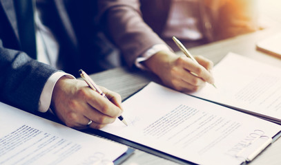 Business young people in the job interview, signed an employment