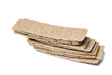 rye bread crackers on a white background , isolated, selective focus, space for text