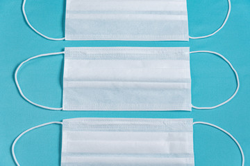 Surgical mascara over minimalist blue background