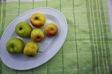 green apples on a plate