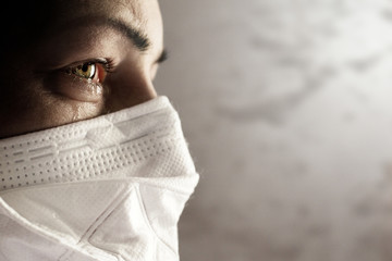 Women with safety mask from coronavirus. Covid 19 alpha, beta, gamma, delta, lambda, mu, omicron...