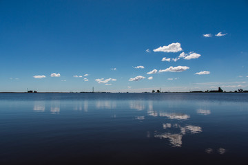 lake reflection sky clouds