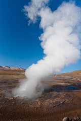 Boiling red mud pools in the geothermal area Sol de Manana in western Bolivia near Uyuni at an elevation of 15,900 feet resembling a landscape on planet mars.