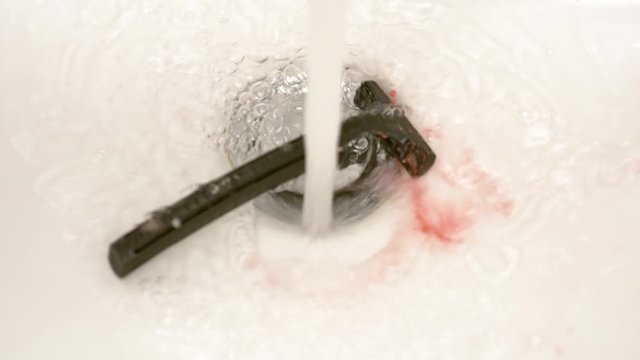 injury during the shaving. razor falls into the water flow in the bathroom sink