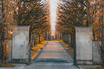 Entrance gate to the Bois-de-vaux cemetery in Lausanne, Switzerland during winter time and in the...